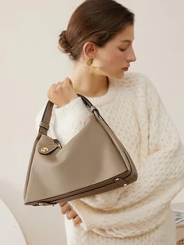 Высококачественная брендовая кожаная сумка 2023, новая сумка через плечо, модная сумка подмышками, простая однотонная женская сумка